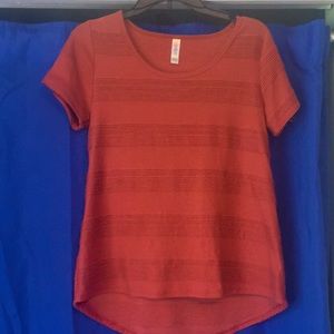 Small orange Lularoe shirt